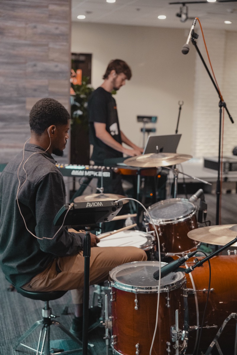 LPU musicians working with drums, keyboards and recording equipment