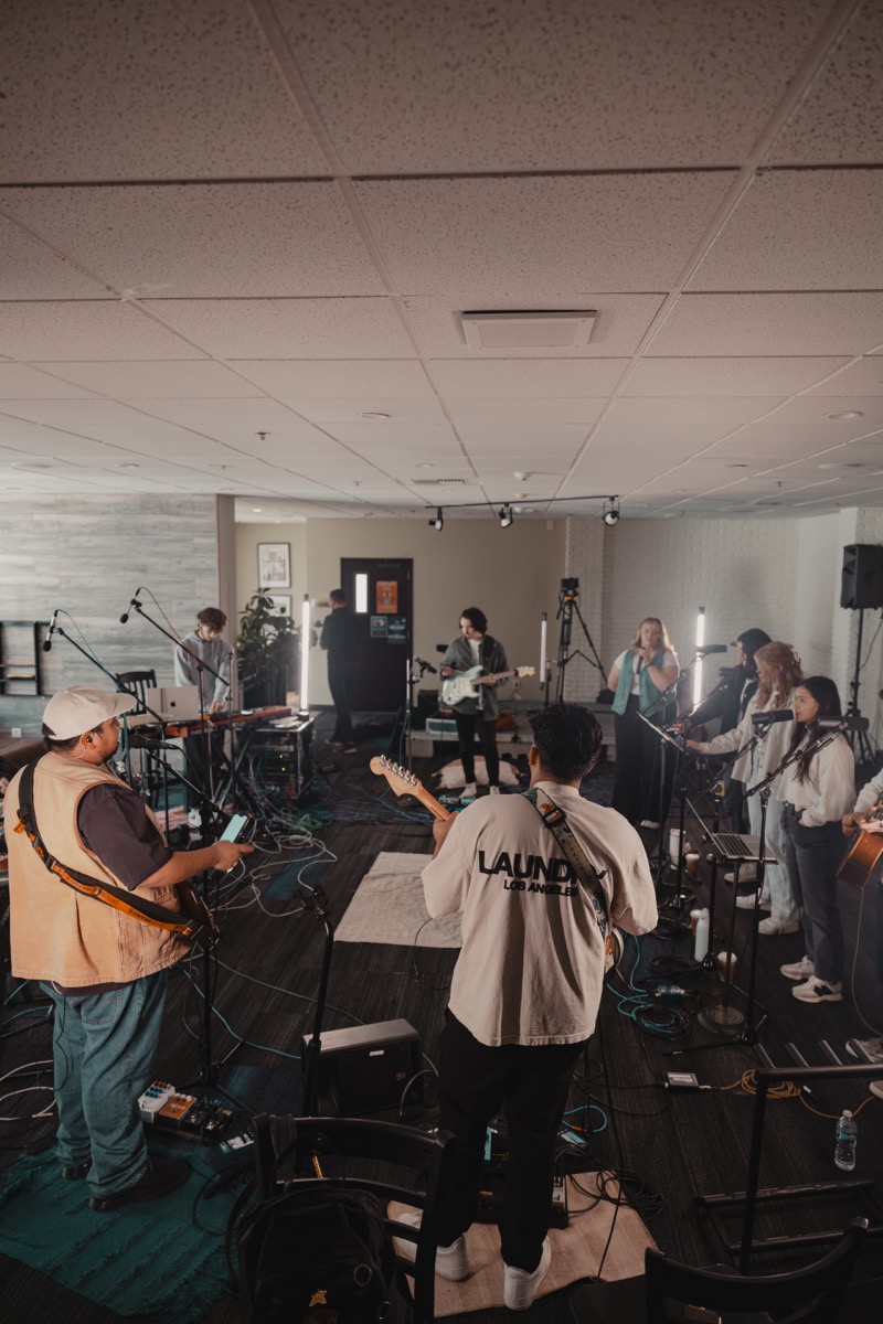 Worship Arts and Media students rehearsing together with instruments, vocals and production equipment